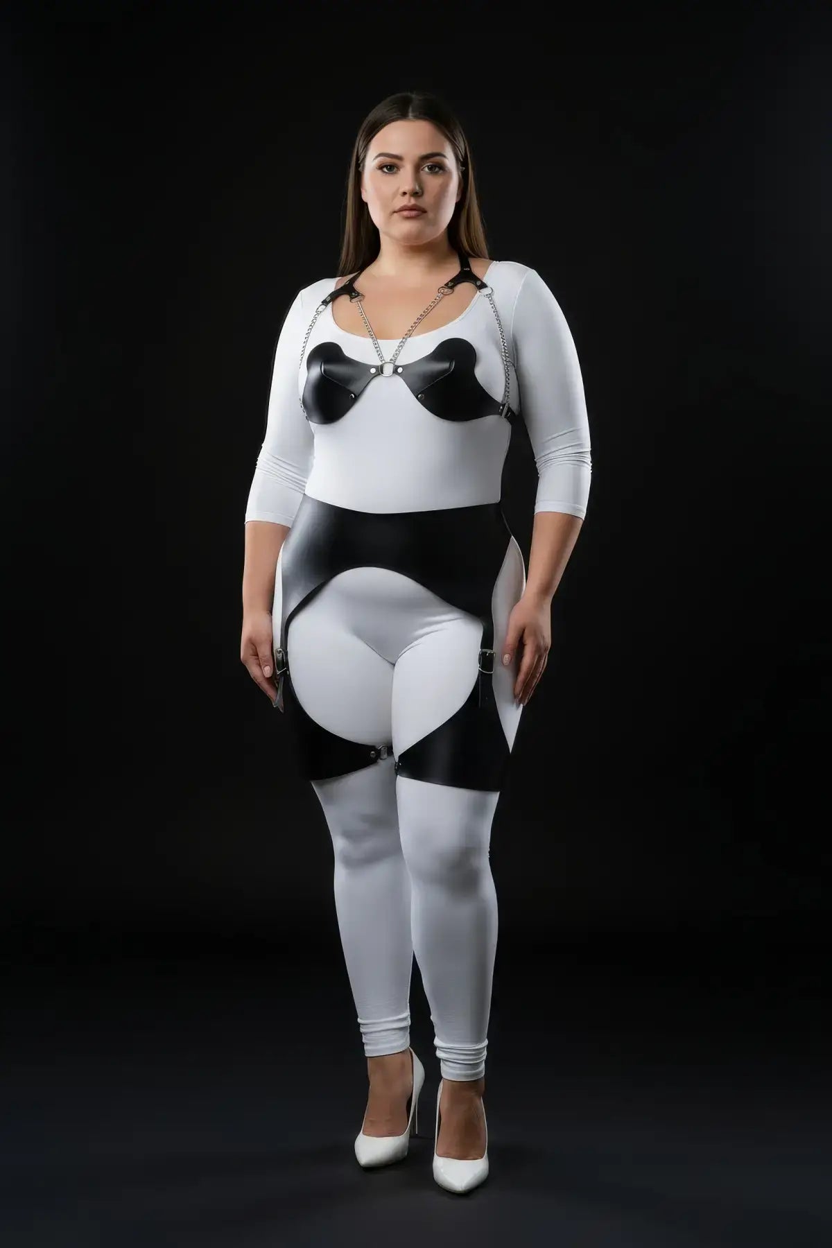 Plus-size sculpted-cup bralette and butterfly hip-frame harness in white/black vegan leather with chain details