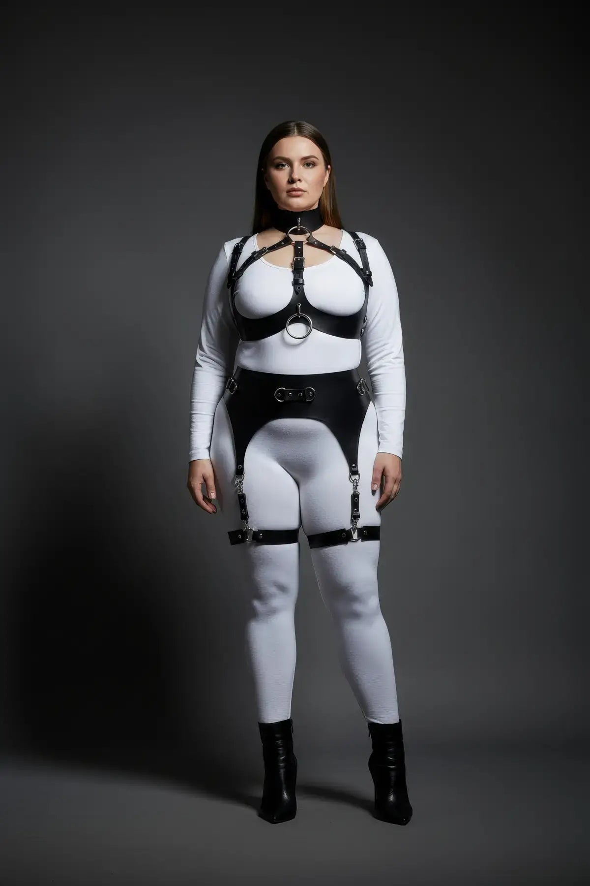 Plus-size structured body harness with snap-hook garter straps by HarnessClub in black vegan leather