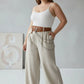 Plus-size tan vegan leather grommet belt with o-ring and chain detail by HarnessClub