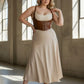 Plus-size tan vegan leather lace-up corset harness with shoulder straps