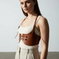 Plus-size tan shoulder-strap corset harness; vegan leather under-bust waist piece.