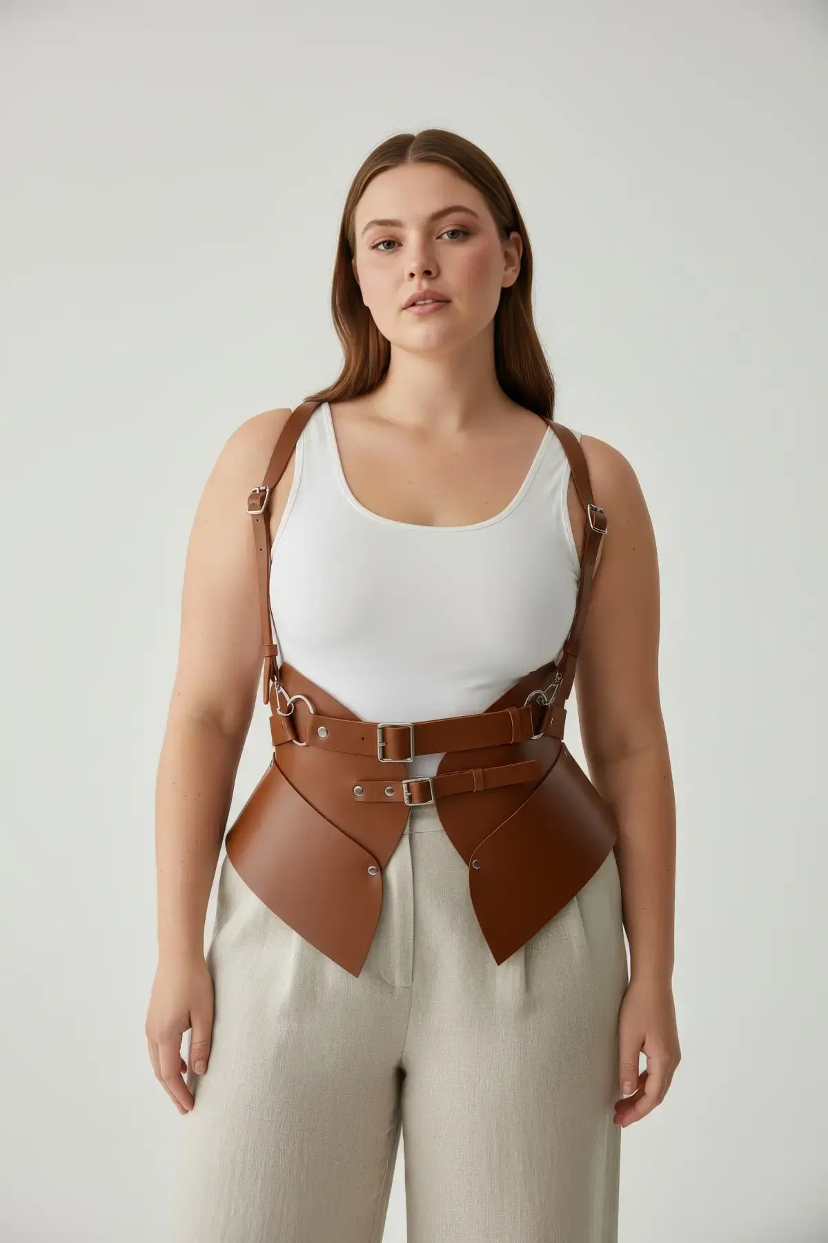 Plus Size Tan Shoulder Strap Harness Vest by HarnessClub in vegan leather with double buckles and peplum waist cincher
