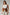 Plus-size tan vegan leather shoulder-strap harness vest with double buckles and peplum waist cincher