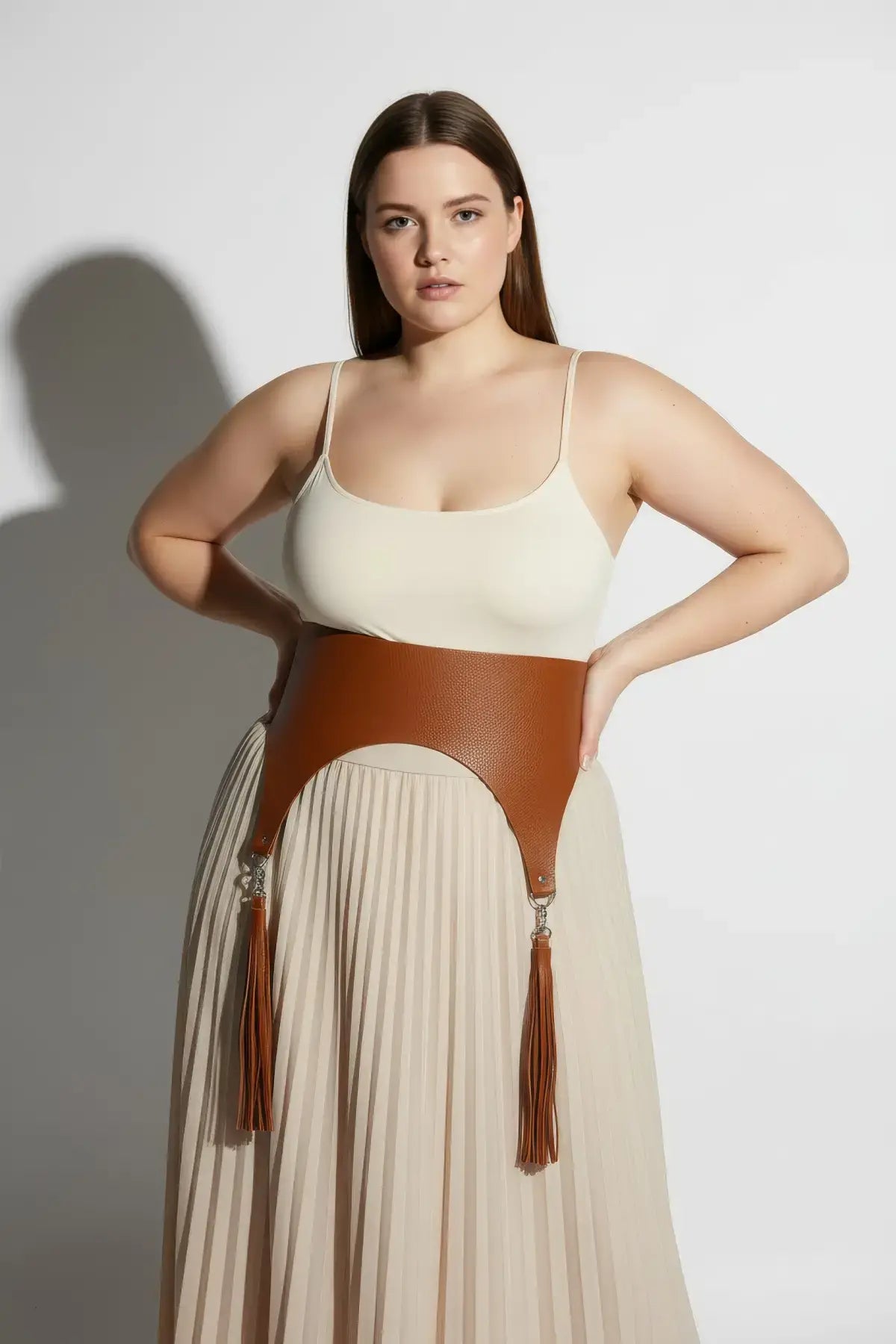 Plus-size tan wide corset waist belt with tassels in cognac vegan leather by HarnessClub
