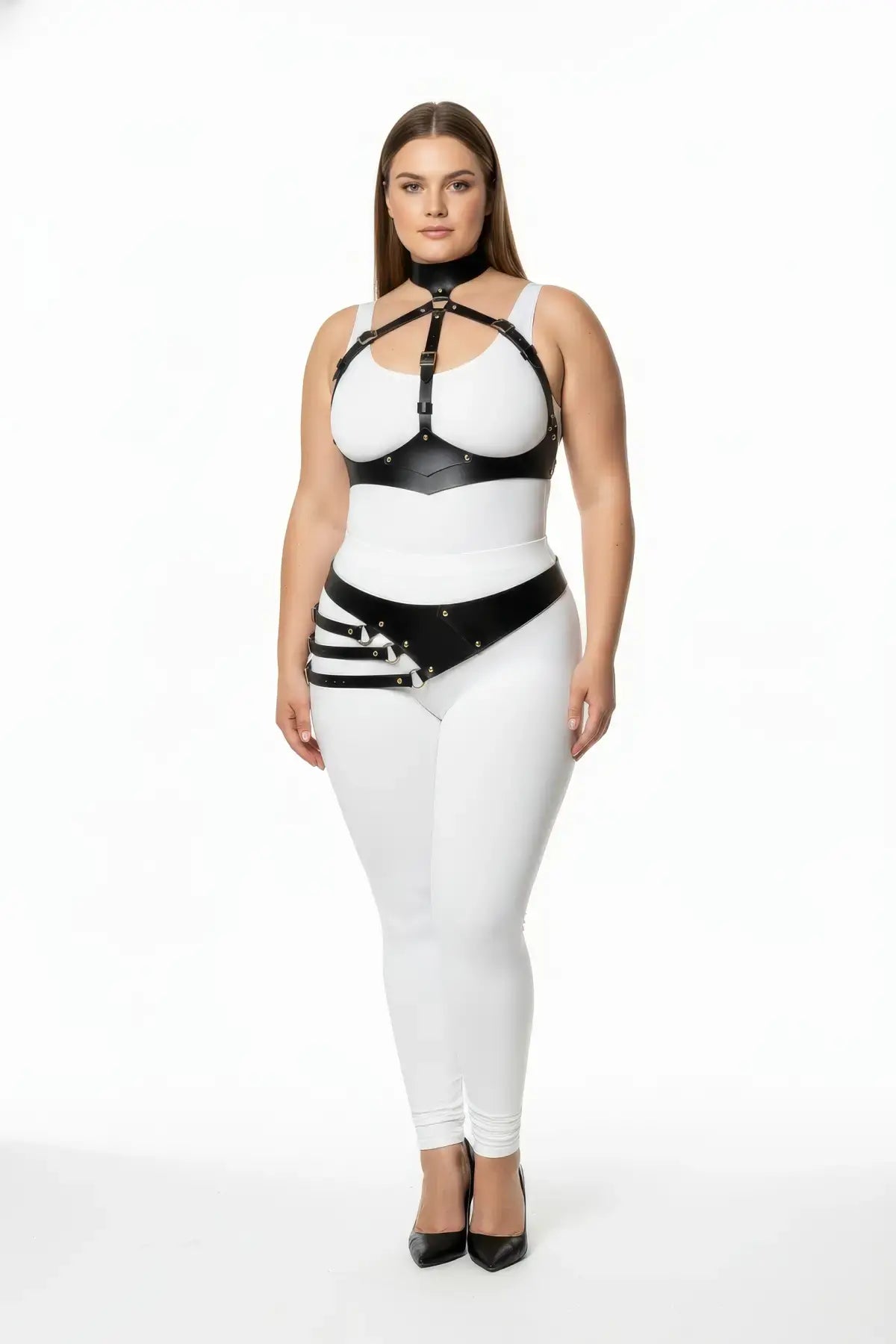Plus Size Underbust Harness with Asymmetric Sash Hip Belt in black vegan leather worn over a white bodysuit.