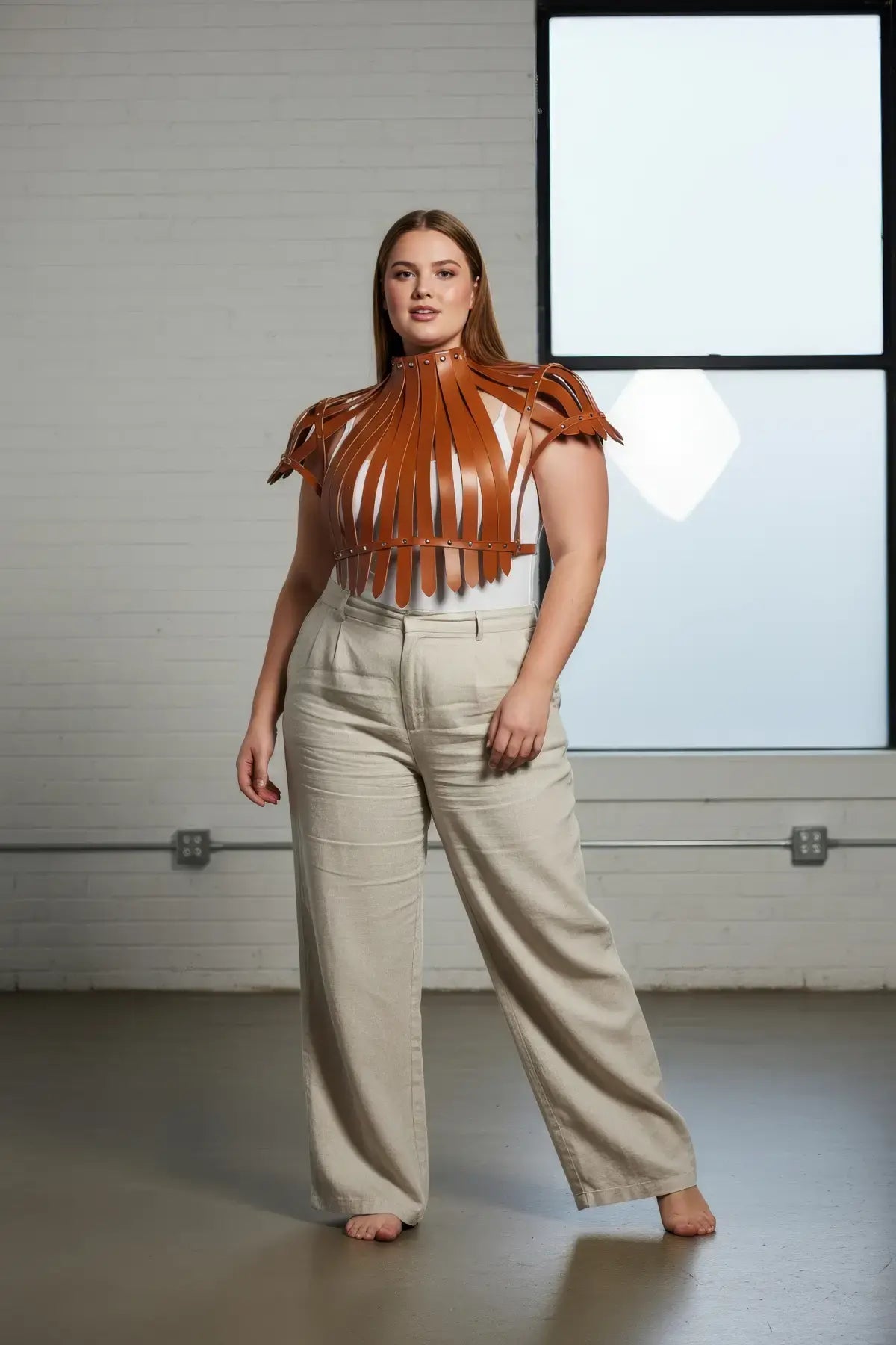 Plus Size Vegan Leather Corset Harness by HarnessClub with rivet detailing and brown shoulder straps