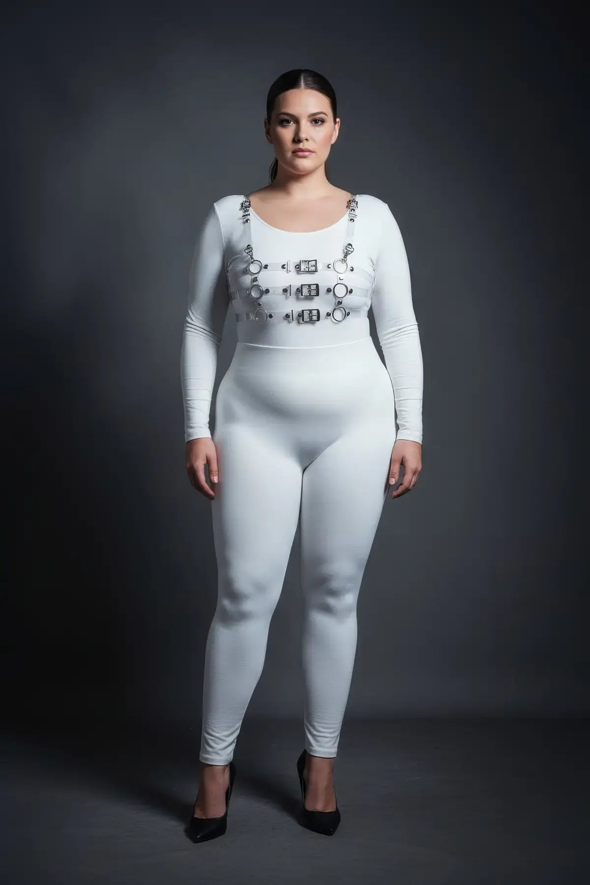 Plus-size white vegan-leather triple-buckle chest harness by HarnessClub worn over a white bodysuit