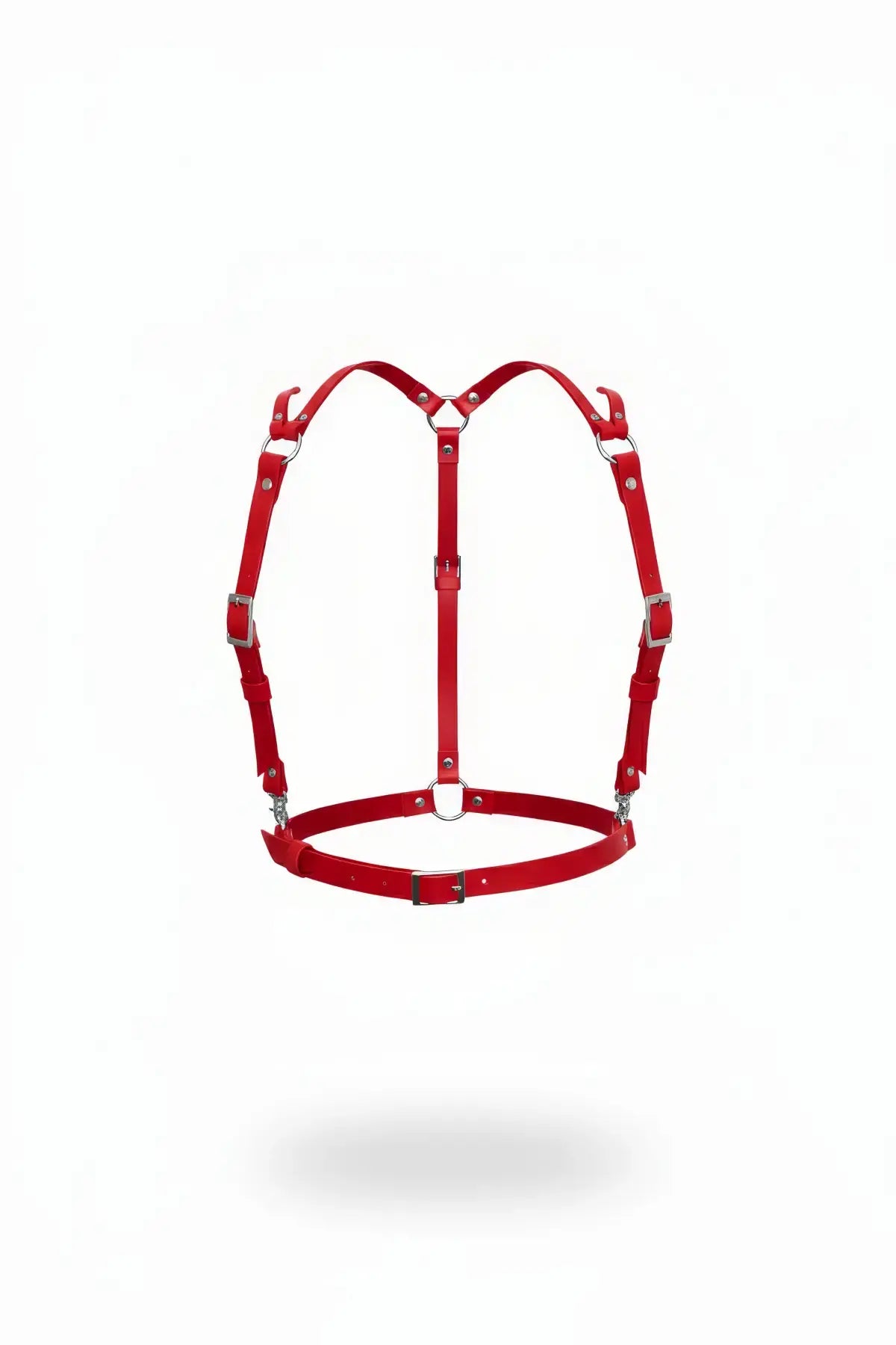 Red adjustable cage chest harness in vegan leather with symmetrical cage design and metal hardware