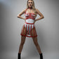 Red cage-strap O-ring mini skirt in vegan leather, worn by a model with matching red straps.