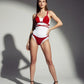HarnessClub red studded vegan leather cup bralette and matching briefs lingerie set worn by model
