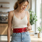 Red wide O-ring vegan leather festival waist belt with silver hardware