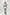 Tan V-front lace-up waist cincher belt in vegan leather, worn over a white slip dress