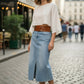Tan wide O-ring waist belt in vegan leather by HarnessClub, shown worn at the waist over a denim skirt.