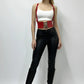 Red vegan-leather corset waist belt with lace-up and suspenders on a model