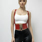 Red vegan-leather corset waist belt with lace-up front and attached suspenders on model