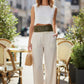 Women's Khaki Wide Double-Buckle Belt, vegan leather waist accessory, shown on a model wearing a white top and beige trousers.