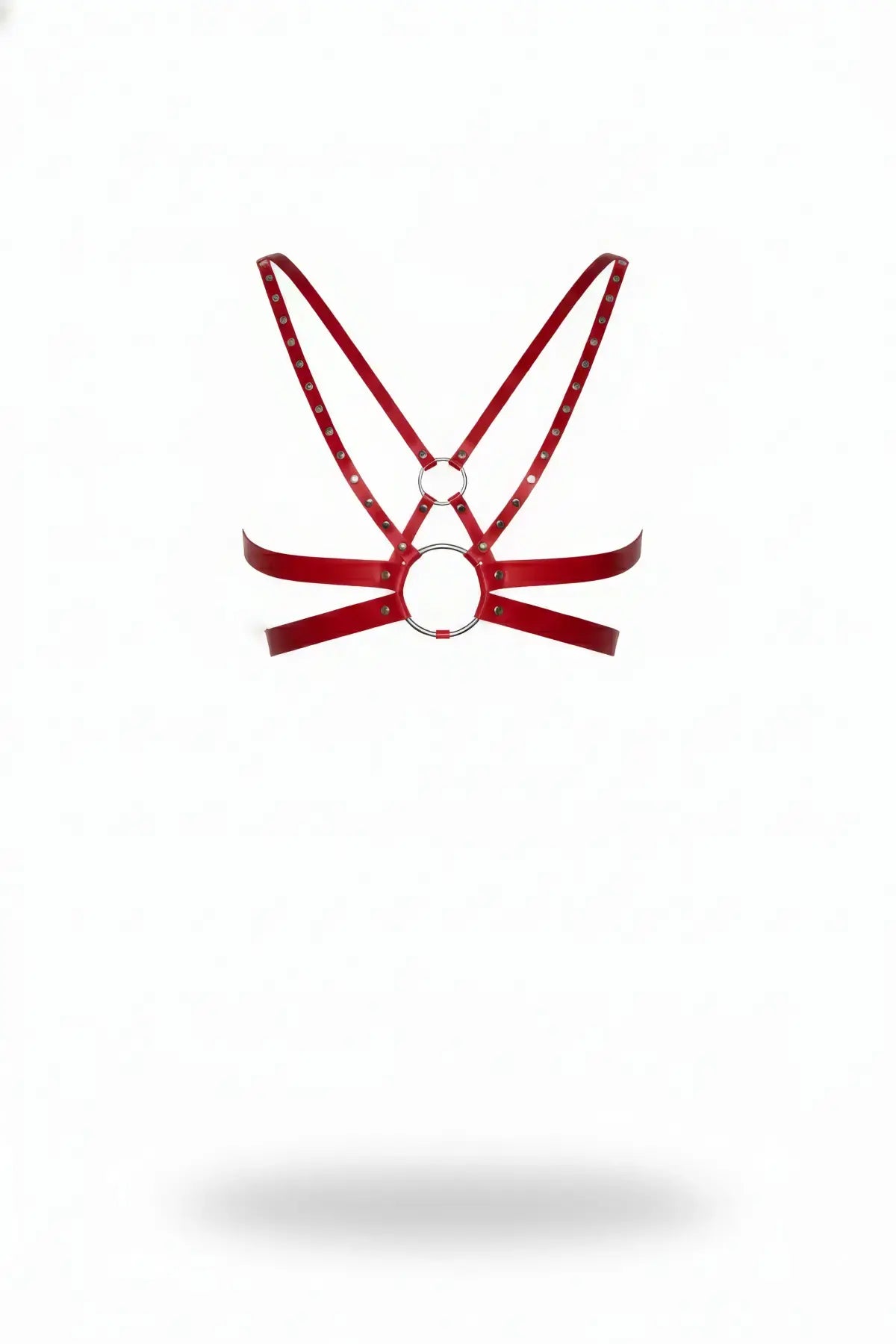 HarnessClub Women's red studded strappy vegan leather body harness with metal rings.